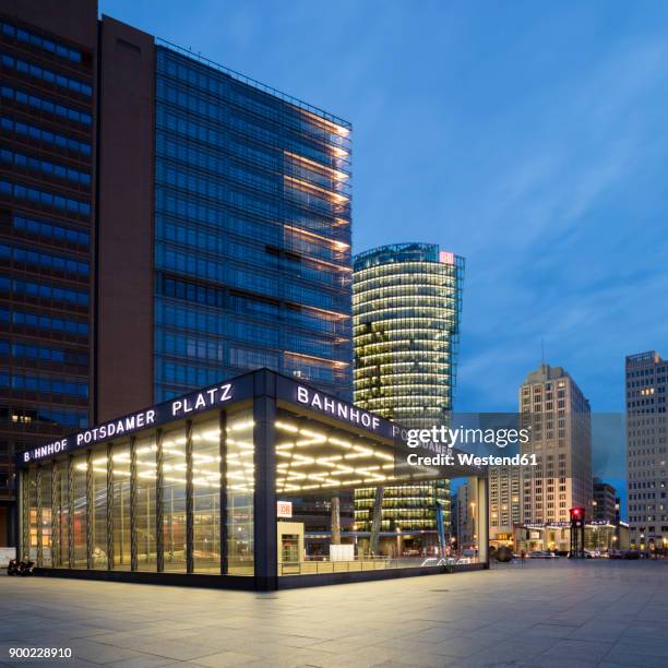 germany, berlin, potsdamer platz, lighted railway station at twilight - potsdamer platz fotografías e imágenes de stock