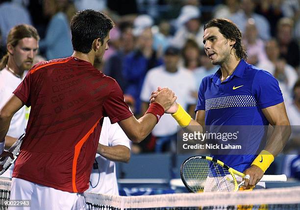 Rafael Nadal of Spain shakes hands with Novak Djokovic of Serbia during day six of the Western & Southern Financial Group Masters on August 22, 2009...
