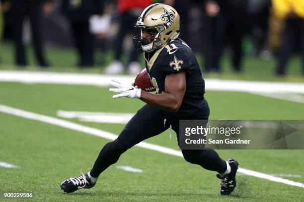 Tommylee Lewis of the New Orleans Saints runs the ball during the first half of a game against the Atlanta Falcons at the Mercedes-Benz Superdome on...