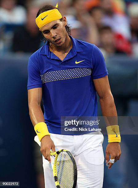 Rafael Nadal of Spain reacts to a missed shot against Novak Djokovic of Serbia in their semi final during day six of the Western & Southern Financial...