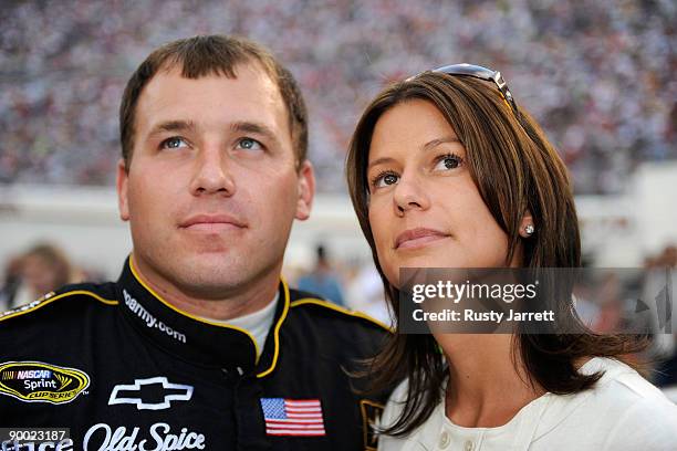 Ryan Newman , driver of the US Army Chevrolet, watches the pre race show with his wife Krissie prior to the start of the NASCAR Sprint Cup Series...