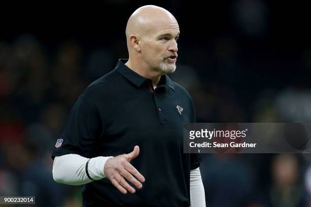 Head coach Dan Quinn of the Atlanta Falcons looks on during a NFL game against the New Orleans Saints at the Mercedes-Benz Superdome on December 24,...