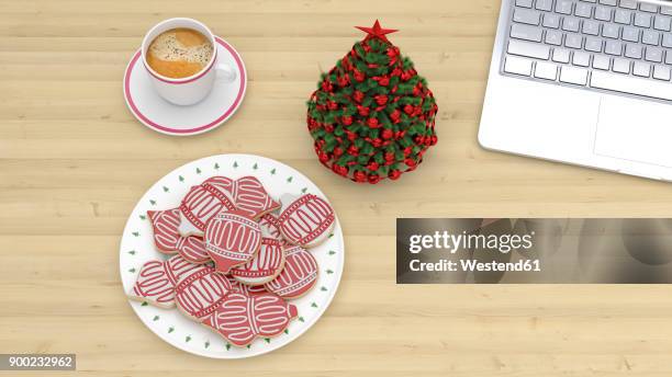 christmas decortaion in the office, cup of coffee and cookies by laptop on desk - cinnamon rolls christmas stock illustrations