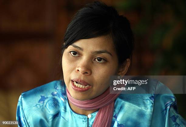 Malaysia-Islam-religion-crime-Singapore BY M. JEGATHESAN Muslim model Kartika Sari Dewi Shukarno speaks during an interview with AFP at her father's...