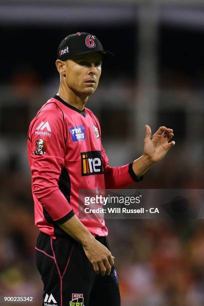 Johan Botha of the Sixers gives fielding instructions during the Big Bash League match between the Perth Scorchers and the Sydney Sixers at WACA on...