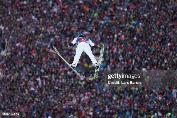 Peter Prevc of Slovenai competes at the first round on day 4 of the FIS Nordic World Cup Four Hills Tournament ski jumping event at Olympia-Schanze...