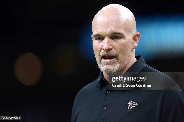 Head coach Dan Quinn of the Atlanta Falcons looks on during a NFL game against the New Orleans Saints at the Mercedes-Benz Superdome on December 24,...