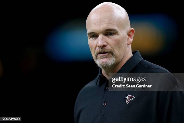 Head coach Dan Quinn of the Atlanta Falcons looks on during a NFL game against the New Orleans Saints at the Mercedes-Benz Superdome on December 24,...