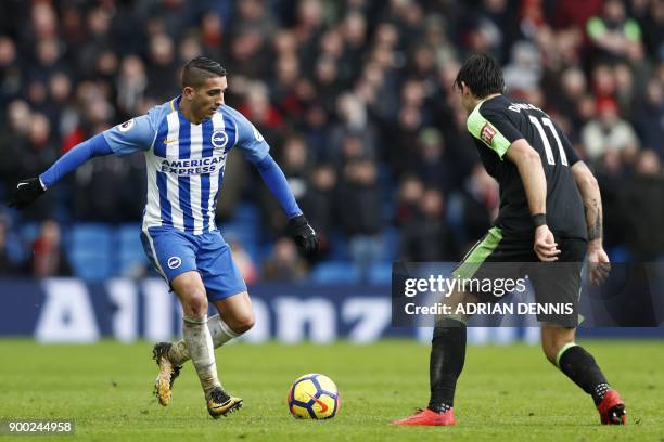 Brighton's French midfielder Anthony Knockaert vies with Bournemouth's English midfielder Charlie Daniels during the English Premier League football...