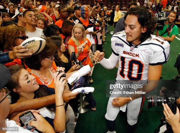 Quarterback Nick Davila of the Spokane Shock greets fans after the team's 74-27 victory over the Wilkes-Barre/Scranton Pioneers in the AFL2 ArenaCup...
