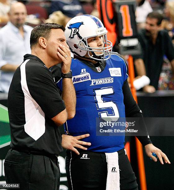 Head coach Rich Ingold of the Wilkes-Barre/Scranton Pioneers talks to his quarterback Ryan Vena during the team's 74-27 loss to the Spokane Shock in...