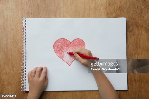 child drawing heart - hand drawn love heart stock-fotos und bilder