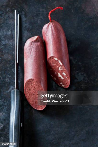 fresh blood sausage on dark background - black pudding stock pictures, royalty-free photos & images