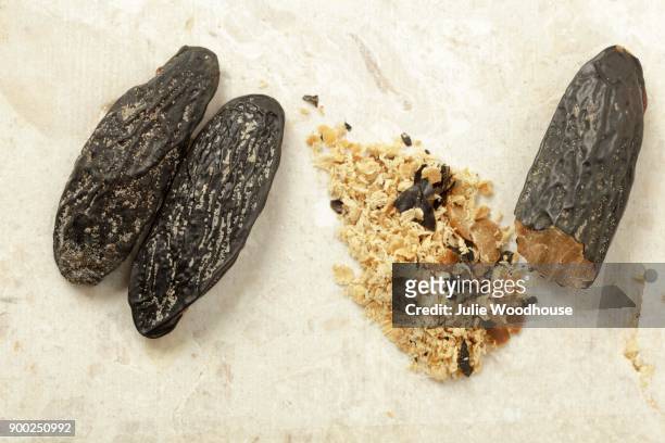 tonka beans, whole and grated - tonka stock pictures, royalty-free photos & images