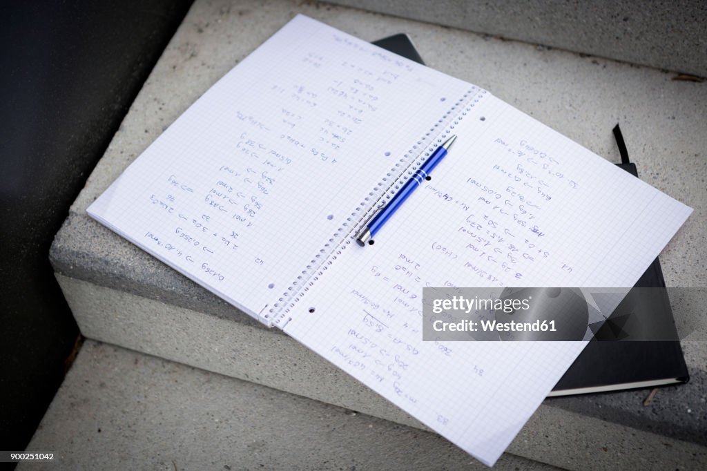 Notebook And Roller Pen On Stairs High-Res Stock Photo - Getty Images