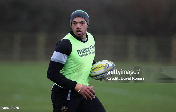 Luther Burrell runs with the ball during the Northampton Saints training session held at Franklin's Gardens on January 1, 2018 in Northampton,...