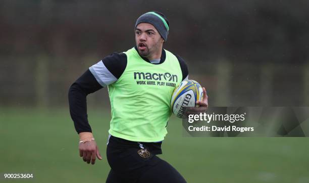 Luther Burrell runs with the ball during the Northampton Saints training session held at Franklin's Gardens on January 1, 2018 in Northampton,...