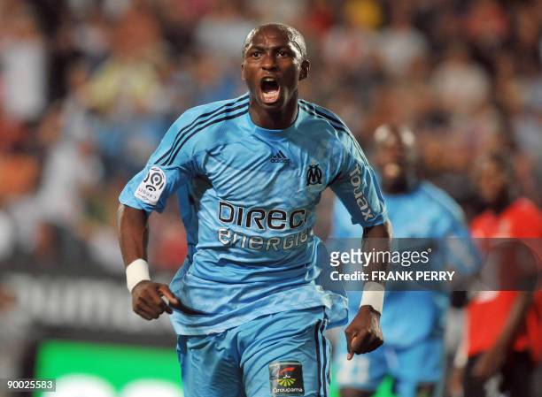 Marseille's Cameroonian midfielder Stephane Mbia jubilates after scoring a goal by teammate Mamadou Niang, during the French L1 football match Rennes...