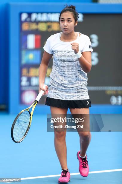 Zarina Diyas of Kazakhstan celebrates a shot during the match against Pauline Parmentier of France during Day 2 of 2018 WTA Shenzhen Open at Longgang...