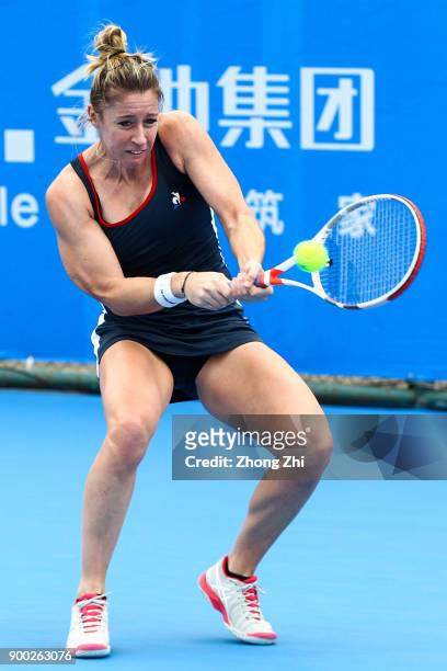Pauline Parmentier of France returns a shot during the match against Zarina Diyas of Kazakhstan during Day 2 of 2018 WTA Shenzhen Open at Longgang...
