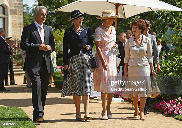 Saxony Governor Stanislaw Tillich, Queen Margrethe II of Denmark, her sister Danish Princess Benedikte and Tliich's wife Veronika attend a luncheon...