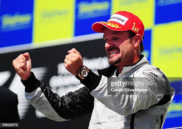 Rubens Barrichello of Brazil and Brawn GP celebrates on the podium after winning the European Formula One Grand Prix at the Valencia Street Circuit...