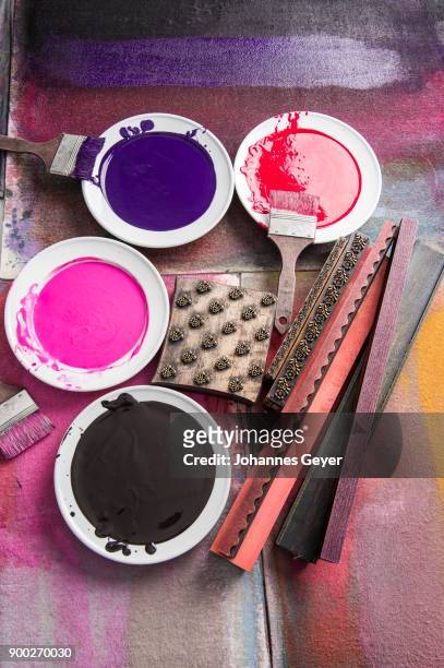 block printing, different colors on plates on felt mat with brush and woodblocks, bad aussee, styria, austria - bad aussee stock pictures, royalty-free photos & images