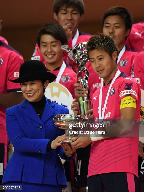 Princess Hisako Takamado and Yoichiro Kakitani of Cerezo Osaka pose with the trophy during the medal ceremony after the 97th All Japan Football...