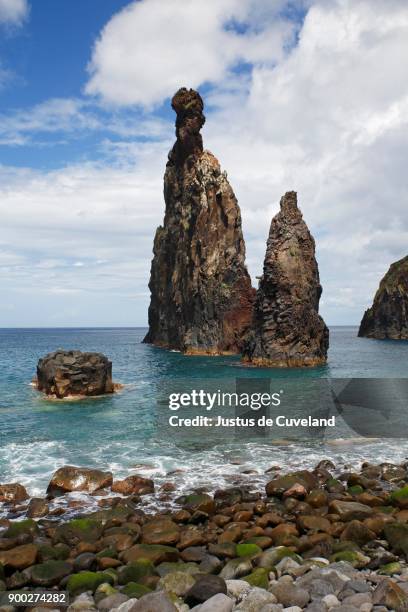 volcanic rock formations, rock needle ilheus da rib, cliffs of ribeira da janela, lanceiros, madeira, portugal - janela ストックフォトと画像