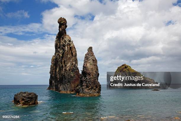 volcanic rock formations, rock needle ilheus da rib, cliffs of ribeira da janela, lanceiros, madeira, portugal - janela stock-fotos und bilder