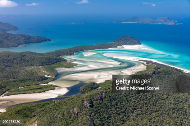 view to hill inlet and whitehaven beach, river meanders, behind border island, whitsunday islands, queensland - whitehaven beach stock pictures, royalty-free photos & images