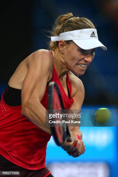 Angelique Kerber of Germany plays a backhand to Elise Mertens of Belgium in the womens singles match on day 3 during the 2018 Hopman Cup at Perth...