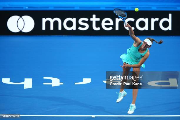 Elise Mertens of Belgium serves to Angelique Kerber of Germany in the womens singles match on day 3 during the 2018 Hopman Cup at Perth Arena on...