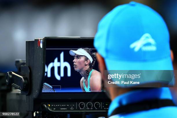 Elise Mertens of Belgium is seen on a television camera monitor in her womens singles match against Angelique Kerber of Germany on day 3 during the...