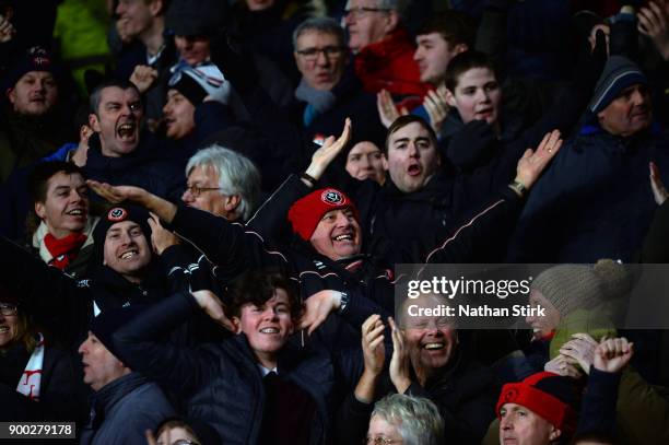 Sheffield United fan celebrates after they score during the Sky Bet Championship match between Derby County and Sheffield United at iPro Stadium on...