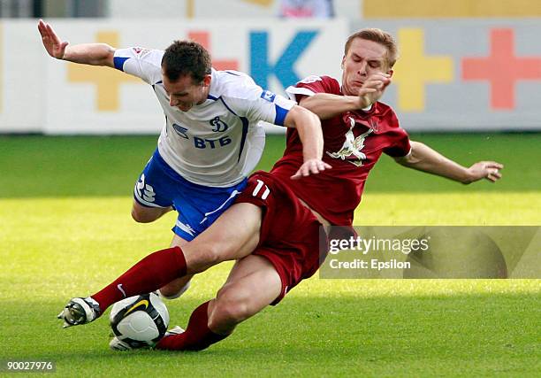 Luke Wilkshire of Dynamo Moscow battles for the ball with Aleksandr Bukharov of Rubin Kazan during the Russian Football League Championship match...