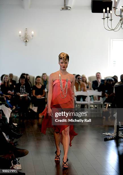 Model exhibits the latest creation of designer Kluk CDGT at the Arise Cape Town Fashion Week at the Val De Vie Winelands Lifestyle Estate on August...