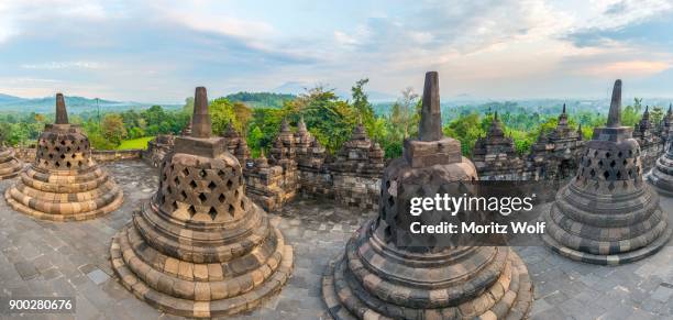 borobudur temple, stupas, cloudy sky, borobudur, yogyakarta, java, indonesia - borobudur temple stock pictures, royalty-free photos & images