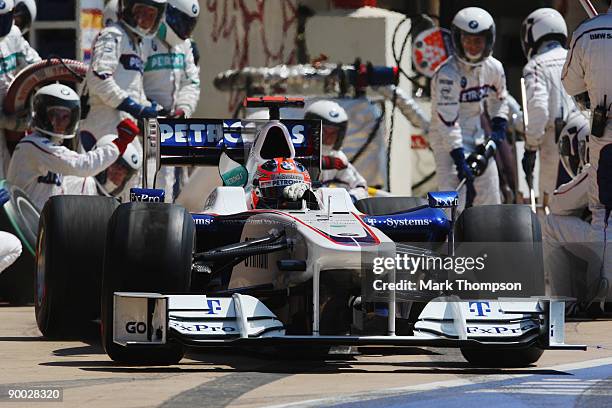 Robert Kubica of Poland and BMW Sauber drives in for a pitstop during the European Formula One Grand Prix at the Valencia Street Circuit on August 23...