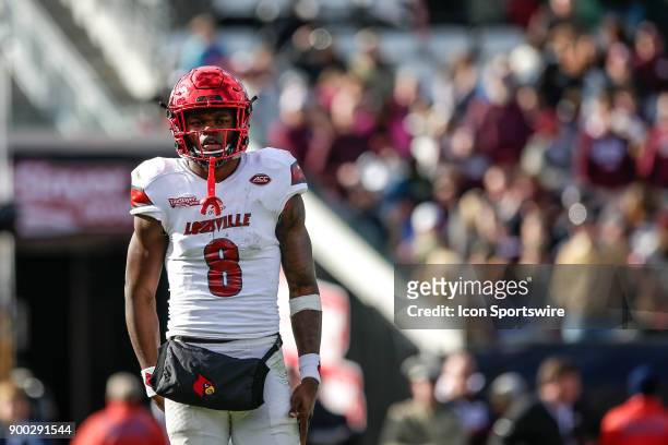 Louisville Cardinals quarterback Lamar Jackson looks on during the game between the Louisville Cardinals and the Mississippi State Bulldogs on...