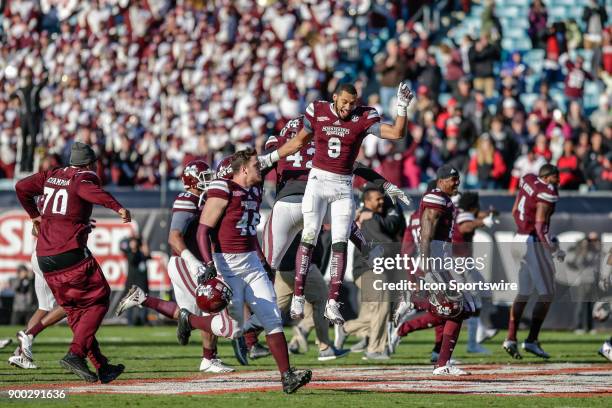 Mississippi State Bulldogs defensive lineman Montez Sweat celebrates the win following the game between the Louisville Cardinals and the Mississippi...