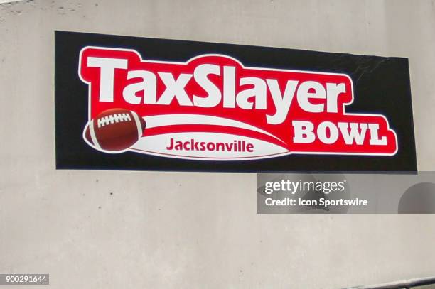 The TaxSlayer Bowl logo during the game between the Louisville Cardinals and the Mississippi State Bulldogs on December 30, 2017 at EverBank Field in...
