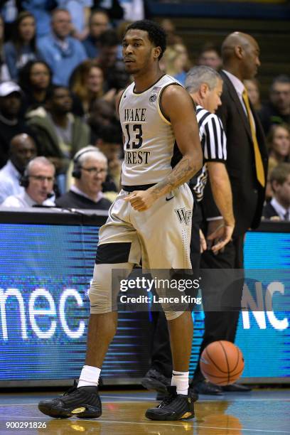 Bryant Crawford of the Wake Forest Demon Deacons looks on during their game against the North Carolina Tar Heels at Dean Smith Center on December 30,...