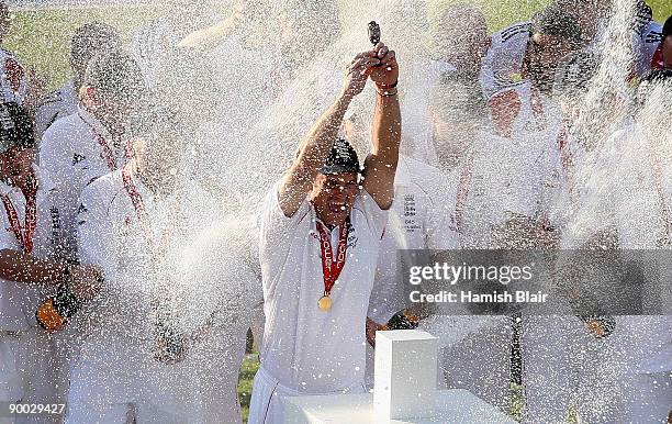 Andrew Strauss captain of England holds aloft the replica urn during the presentations after day four of the npower 5th Ashes Test Match between...