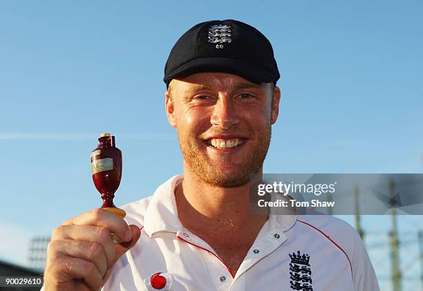 Andrew Flintoff of England poses with the Ashes urn after day four of the npower 5th Ashes Test Match between England and Australia at The Brit Oval...