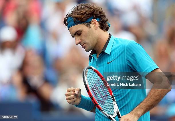 Roger Federer of Switzerland celebrates a point against Novak Djokovic of Serbia in the Singles Final during day seven of the Western & Southern...