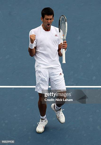 Novak Djokovic of Serbia celebrates a point against Roger Federer of Switzerland in the Singles Final during day seven of the Western & Southern...