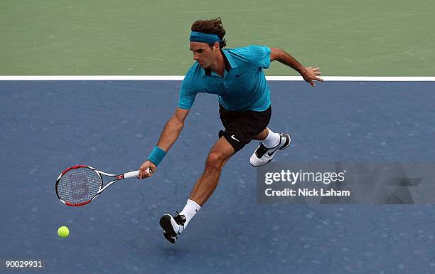 Roger Federer of Switzerland hits a forehand against Novak Djokovic of Serbia in the Singles Final during day seven of the Western & Southern...