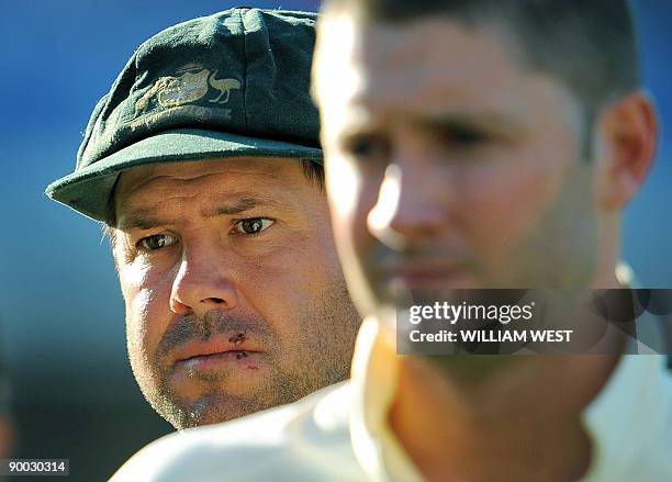 Australian captain Ricky Ponting and Michael Clarke reflect at the end of the game as England defeats Australia on the fourth day of the fifth and...