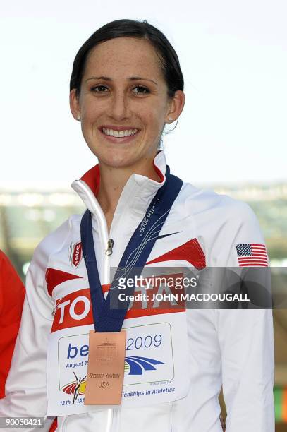 Shannon Rowbury celebrates during the women's 1500m medal ceremony of the 2009 IAAF Athletics World Championships on August 23, 2009 in Berlin....